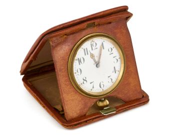 W.O. Bentley’s 8-Day Travel Clock with Brown Leather Case, c. 1920