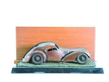A Bugatti 57 SC Atlantic bronze sculpture by Albert Guibara