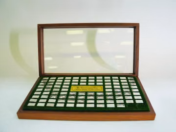 A Franklin Mint 'Centennial Car' Collection, silver ingot set. Missing 2 ingots.