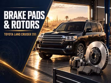 When should brake pads and rotors be replaced on a Toyota Land Cruiser 200?
