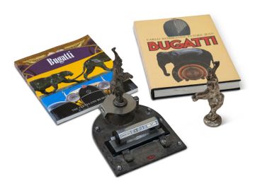 Bugatti Desktop Calendar, Elephant Mascot, and Books