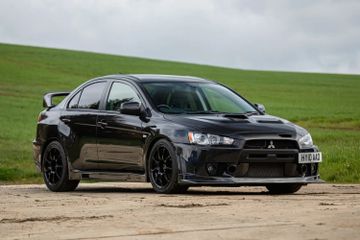 Mitsubishi Lancer Evolution X FQ-400 - 8,000 miles from, 2010