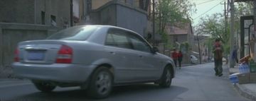 Hainan-Mazda 323 in 囧人之越挠越痒 (2013)