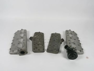 Aluminum Ford flathead stock cylinder heads, one pair for 21 stud engine the other for V8-60 engine