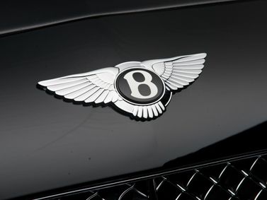 Bentley Continental GT I، كوبيه — شعار السيارة واسم الطراز
