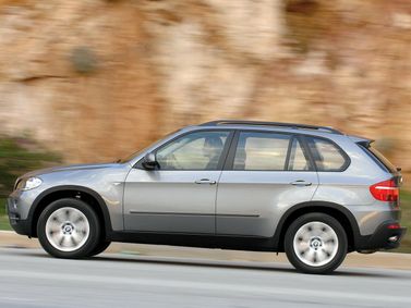 BMW X5 II (E70)، دفع رباعي 5 أبواب — منظر من الجانب الأيسر