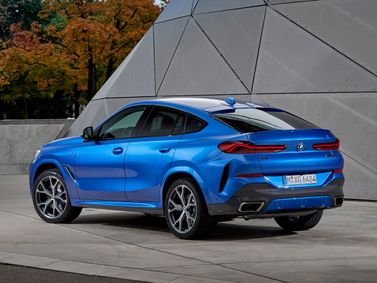 BMW X6 III (G06), Внедорожник 5 дв. — вид сзади слева