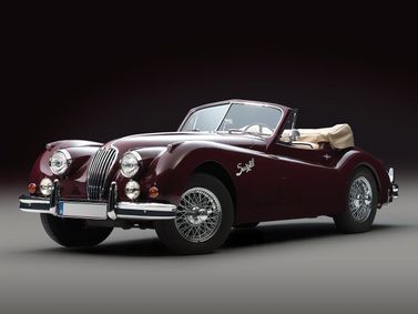 Jaguar XK XK140، قابلة للتحويل — منظر أمامي بزاوية ثلاثة أرباع