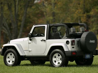 Jeep Wrangler III (JK)، دفع رباعي 3 أبواب — منظر خلفي أيسر