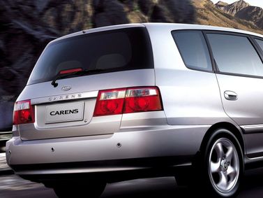 Kia Carens I (RS) Рестайлинг, Компактвэн — вид сзади справа