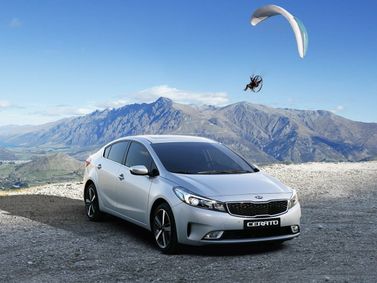 Kia Cerato III فيس ليفت الثالث (كلاسيكي)، سيدان — منظر أمامي أيمن