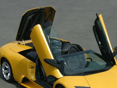 Lamborghini Murcielago I، رودستر — منظر خلفي بزاوية ثلاثة أرباع