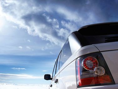 Land Rover Range Rover Sport I (L320) Facelift، دفع رباعي 5 أبواب — منظر خلفي بزاوية ثلاثة أرباع
