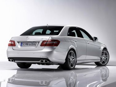 Mercedes-Benz E-Class AMG IV (W212، S212)، سيدان — منظر خلفي أيمن