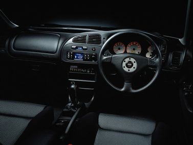 Mitsubishi Lancer Evolution V، سيدان — لوحة القيادة