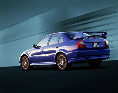 Mitsubishi Lancer Evolution سادساً، سيدان — منظر خلفي أيسر