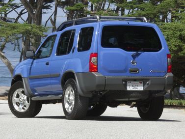 Nissan Xterra أنا فيس ليفت، دفع رباعي 5 أبواب — منظر خلفي أيسر