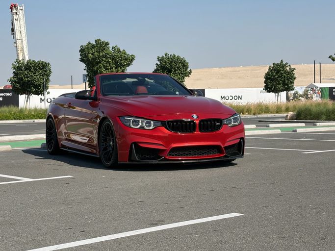 Used BMW M4 F82/F83, 3.0 l, 2015 in Abu Dhabi, Orange color. GCC Specs | AUTO.AE