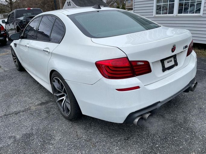 Used BMW M5 Competition Edition V (F10) Facelift, 4.4 l, 2014 in Abu Dhabi, White color. American Specs | AUTO.AE