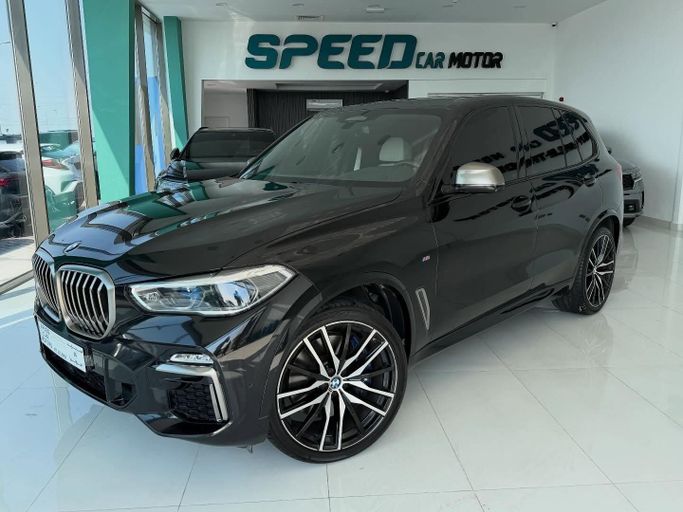 Подержанный BMW X5 M50i IV (G05/G18), 4.4 л, 2020 в Абу-Даби от Speed Car Motors Черный цвет.  | AUTO.AE
