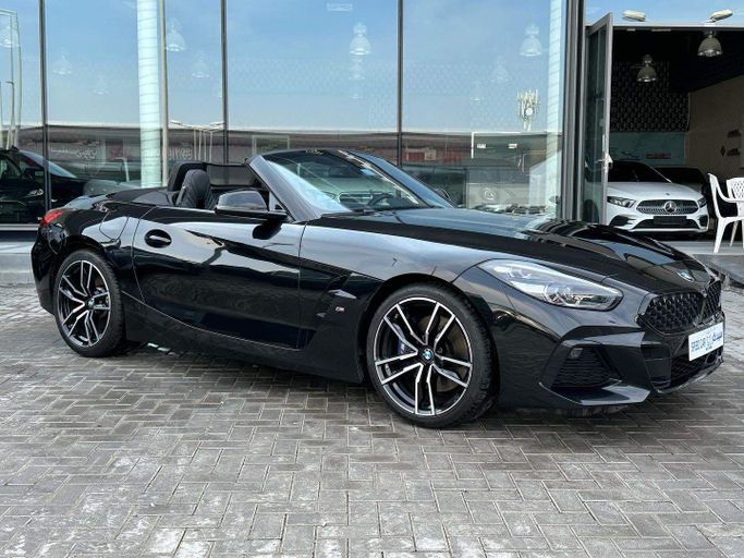 Used BMW Z4 30i III (G29), 2.0 l, 2021 in Abu Dhabi by Speed Car Motors, Black color.  | AUTO.AE