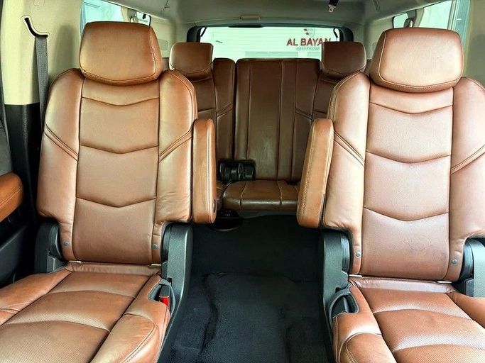 Used Cadillac Escalade IV, 6.2 l, 2020 in Abu Dhabi by Al Bayan Motors, Black color. GCC Specs | AUTO.AE