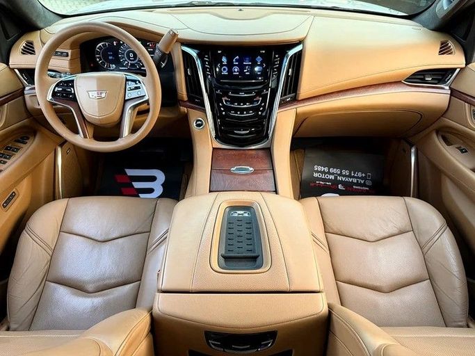Used Cadillac Escalade IV, 6.2 l, 2017 in Abu Dhabi by Al Bayan Motors, Golden color. GCC Specs | AUTO.AE