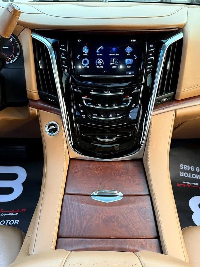 Used Cadillac Escalade IV, 6.2 l, 2017 in Abu Dhabi by Al Bayan Motors, Golden color. GCC Specs | AUTO.AE