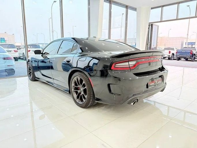 Used Dodge Charger SRT VII (LD) Facelift, 6.4 l, 2021 in Abu Dhabi by Al Bayan Motors, Black color. GCC Specs | AUTO.AE
