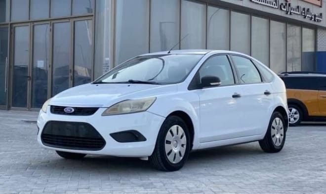 Подержанный Ford Focus II Рестайлинг, 2.0 л, 2009 в ОАЭ, Абу-Даби от The Shark Automobile Showroom Белый цвет. GCC | AUTO.AE | Объявление #282853