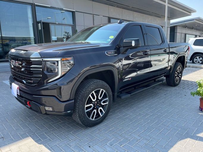 Used GMC Sierra IV, 6.2 l, 2021 in Abu Dhabi by Golden coast automobile showroom, Black color. GCC Specs | AUTO.AE