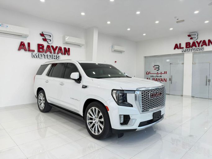 Used GMC Yukon V, 6.2 l, 2023 in Abu Dhabi by Al Bayan Motors, White color. GCC Specs | AUTO.AE