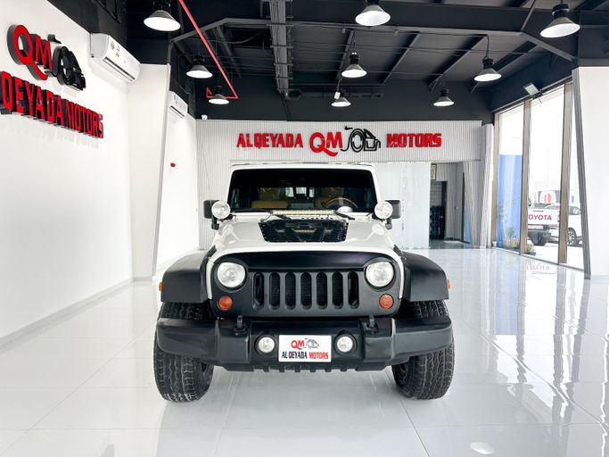Used Jeep Wrangler III (JK), 3.6 l, 2010 in Abu Dhabi by Al Qeyada Motors, White color. GCC Specs | AUTO.AE