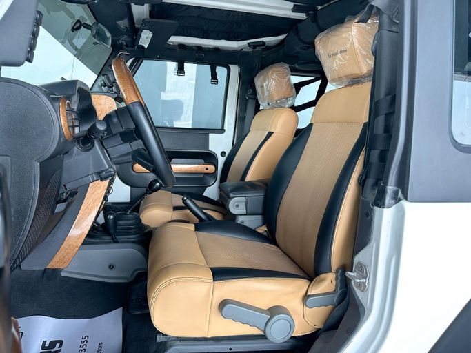 Used Jeep Wrangler III (JK), 3.6 l, 2010 in Abu Dhabi by Al Qeyada Motors, White color. GCC Specs | AUTO.AE