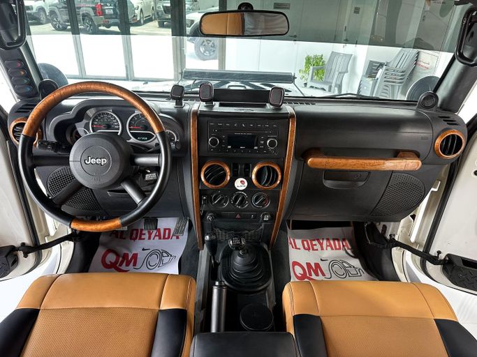 Used Jeep Wrangler III (JK), 3.6 l, 2010 in Abu Dhabi by Al Qeyada Motors, White color. GCC Specs | AUTO.AE