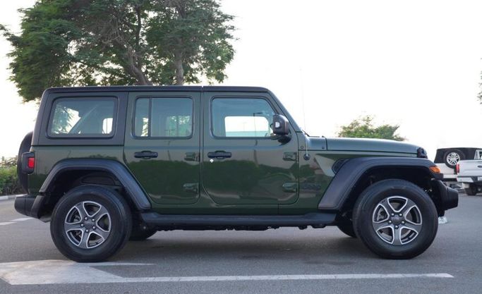 Used Jeep Wrangler IV (JL), 3.6 l, 2022 in Abu Dhabi by Advantage Motors, Green color. GCC Specs | AUTO.AE