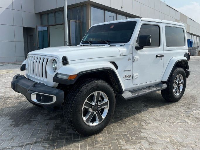 Подержанный Jeep Wrangler IV (JL), 3.6 л, 2019 в Абу-Даби от Golden coast automobile showroom Белый цвет.  | AUTO.AE