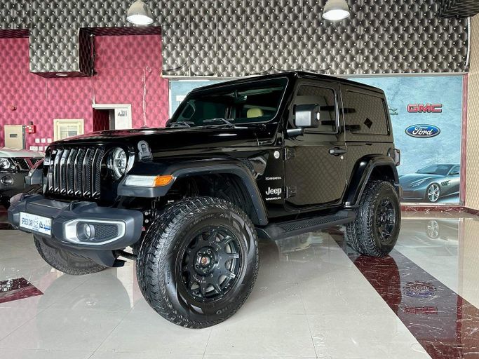 Подержанный Jeep Wrangler IV (JL), 2.0 л, 2018 в Абу-Даби от Speed Car Motors Черный цвет. GCC | AUTO.AE