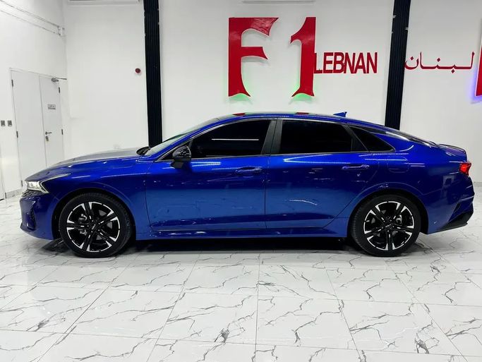 مستعملة Kia K5 ثالثاً, 1.6 l, 2022 في في أبو ظبي من F1 Lebanon vehicle Trading، اللون أزرق. المواصفات الأمريكية | AUTO.AE