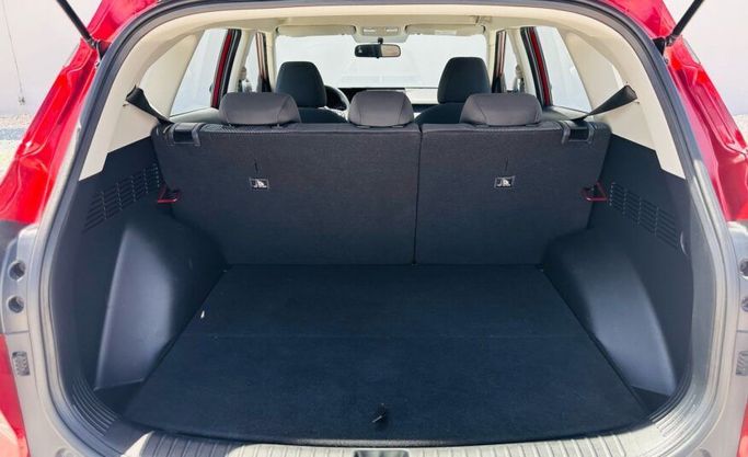 Подержанный Kia Seltos I, 1.6 л, 2021 в Абу-Даби от Advantage Motors Красный цвет. GCC | AUTO.AE