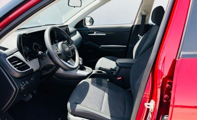 Подержанный Kia Seltos I, 1.6 л, 2021 в Абу-Даби от Advantage Motors Красный цвет. GCC | AUTO.AE