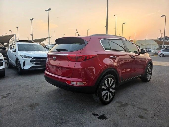 Used Kia Sportage III Facelift, 2.4 l, 2016 in Abu Dhabi by Al Waleed Used Cars, Red color. GCC Specs | AUTO.AE