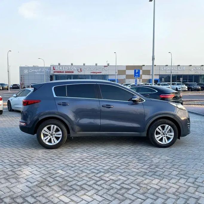 Used Kia Sportage IV, 1.6 l, 2018 in Abu Dhabi by Emco car, Blue color. GCC Specs | AUTO.AE