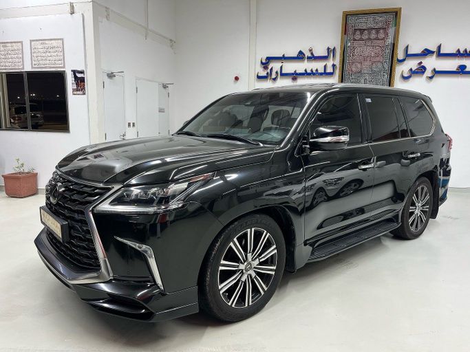 Used Lexus LX 570 III Facelift 2, 5.7 l, 2021 in Abu Dhabi by Golden coast automobile showroom, Black color.  | AUTO.AE