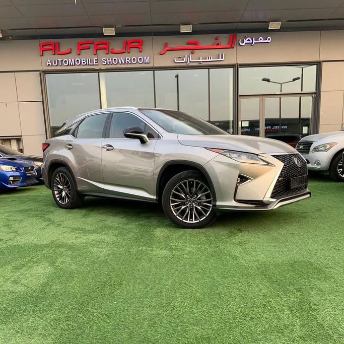 Used Lexus RX 450h IV Facelift, 3.5 l, 2020 in Abu Dhabi by Al Fajr Automobile showroom, Silver color. GCC Specs | AUTO.AE