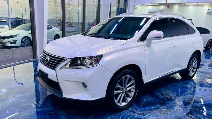 Подержанный Lexus RX 350 III Рестайлинг, 3.5 л, 2013 в Абу-Даби от Al Fateh Used Automobiles Showroom Белый цвет. GCC | AUTO.AE