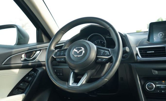 Used Mazda 3 III (BM) Facelift, 2.0 l, 2017 in Abu Dhabi by Advantage Motors, Red color. GCC Specs | AUTO.AE