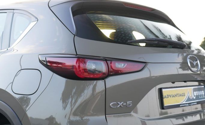 مستعملة Mazda CX-5 شد الوجه الثاني, 2.5 l, 2023 في في أبو ظبي من Advantage Motors، اللون أخضر. مواصفات الخليج | AUTO.AE