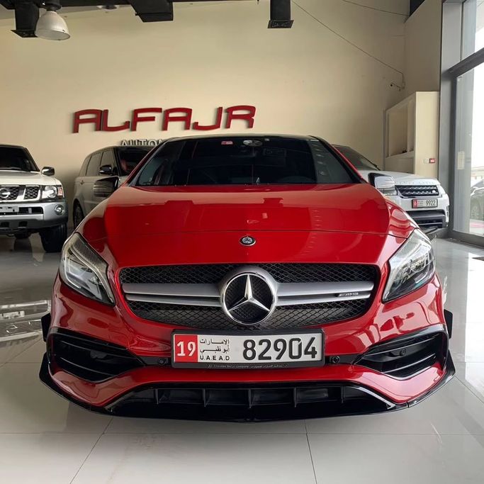 Подержанный Mercedes-Benz A-Class AMG 45 AMG I (W176) Рестайлинг, 2.0 л, 2016 в Абу-Даби от Al Fajr Automobile showroom Красный цвет. GCC | AUTO.AE