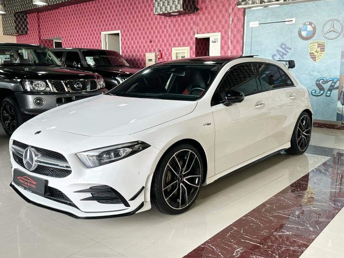 Подержанный Mercedes-Benz A-Class AMG 35 AMG II (W177), 2.0 л, 2020 в Абу-Даби от Speed Car Motors Белый цвет. GCC | AUTO.AE